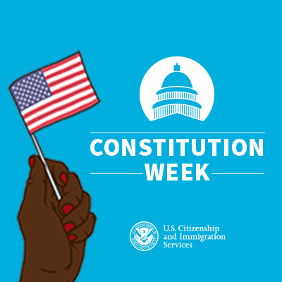 Text Constitution Week with a graphic of a hand waving a flag